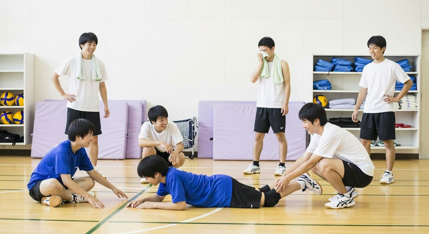 Group training session in a bright gymnasium