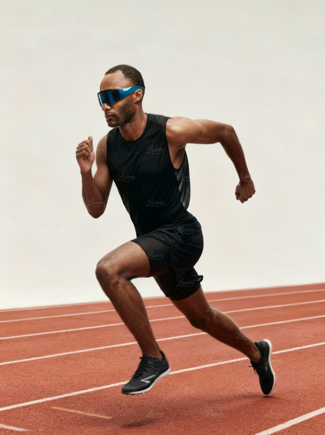 Athlete running on an outdoor track